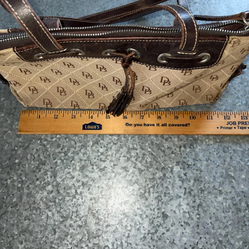 Dooney & Bourke Brown Signature Jacquard Canvas Black Tassel Shoulder Bag